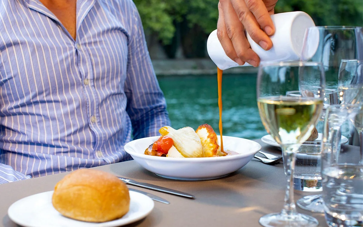 Lunch served beside a cruise boat window